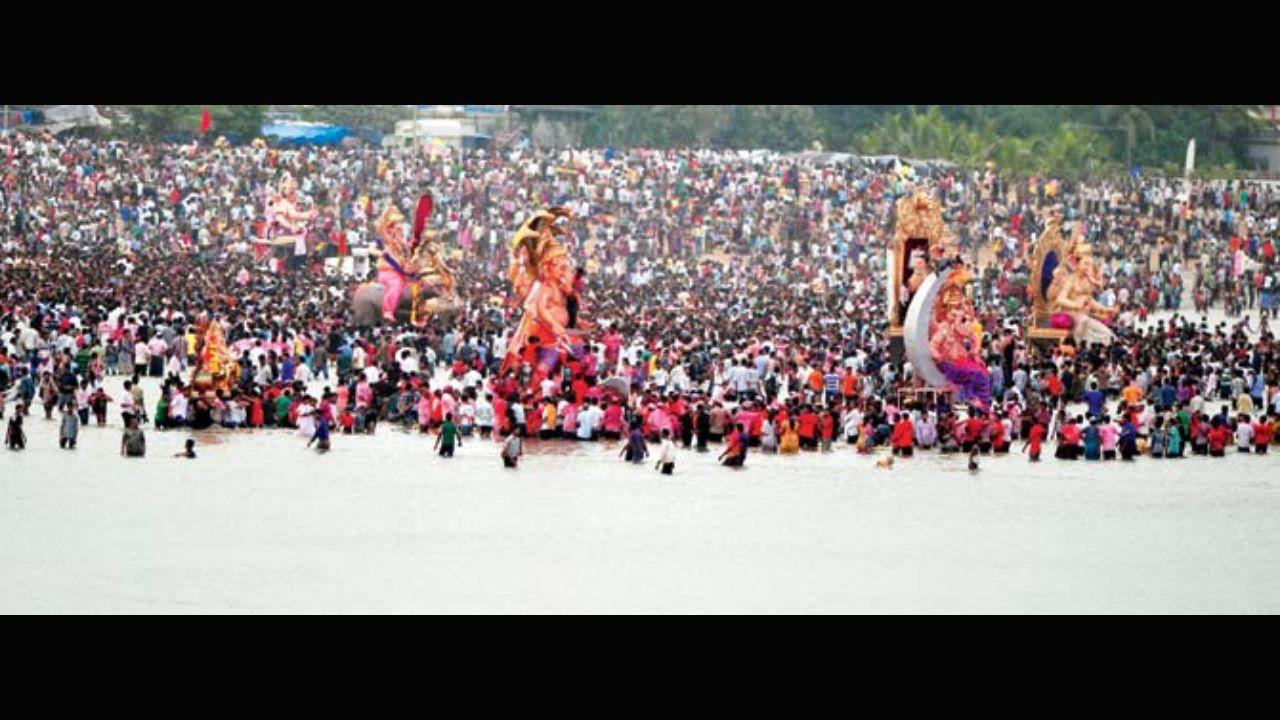 Juhu Beach may be one of the most popular locations in the city to watch idols of Ganesha being immersed every year but Girgaum Chowpatty is not far behind. Located near Marine Drive, it sees thousands of immersions every year including that of 'Lalbaugcha Raja', one of the most popular Ganesh idols in the city. Photo: Mid-day/file pic